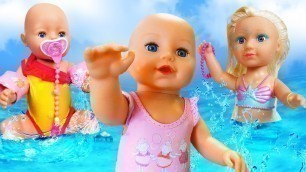 'Baby Annabell doll & kids play baby dolls at the beach - Baby doll morning routine'