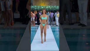 'NYSW Wrap Party model in blue bikini'