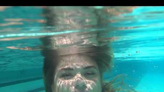 'amazing girl in underwater pool swimwear fashion show at DC swim week'