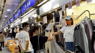 'Walking in China clothing store street | China street | Chinese fashion clothes'