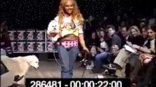 'Lil\' Kim walks her dogs in the Paws for Style fashion show (2002)'