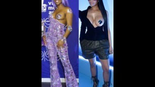 'Nicki Minaj Pulls a Lil Kim While Sitting Front Row at Paris Fashion Week Show'