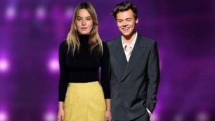 'Harry performing ‘Kiwi’ at the Victoria’s Secret Fashion Show feat Camille Rowe'