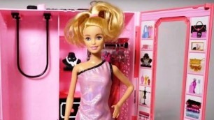 'Barbie Doll dress-up game. Videos for kids.'