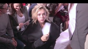 'Camera Shy Elizabeth Olsen attending the Dior Fashion Show in Paris'