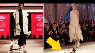 'Random Cat Crashes Fashion Show, Fights Models'